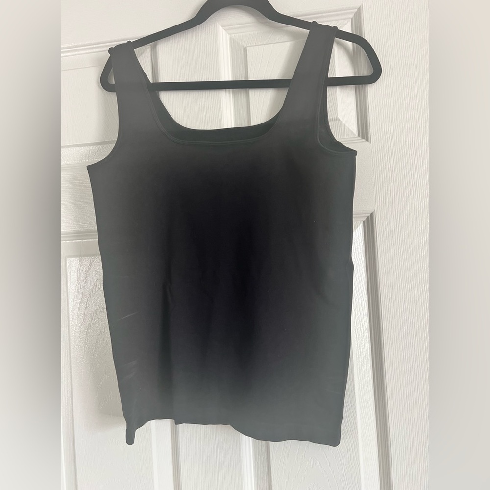 Black tank and white tank